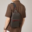 タケオキクチ(TAKEO KIKUCHI)の【ヘビタン】レザーコンビナイロン ワンショルダーバッグ ブラウン(043)