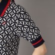 ドレステリア(レディース)(DRESSTERIOR(Ladies))の【大人百花春号掲載 モデル美香さん着用】オーバーラップサークルジャカードポロニット18