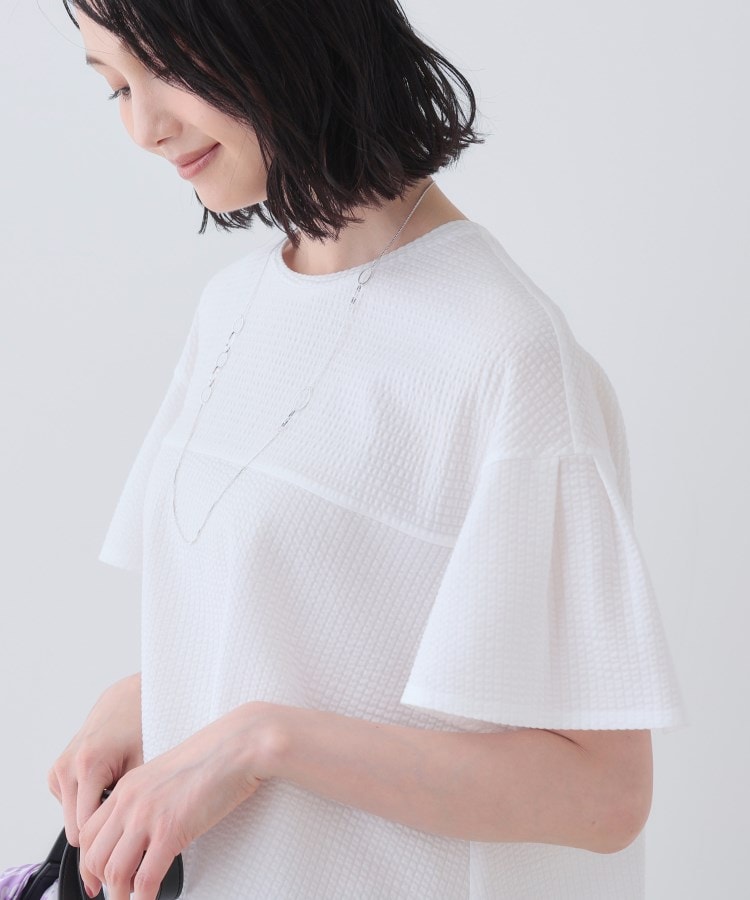 インディヴィ(INDIVI)の【洗える／体型カバー】凹凸素材フレアデザイントップス5