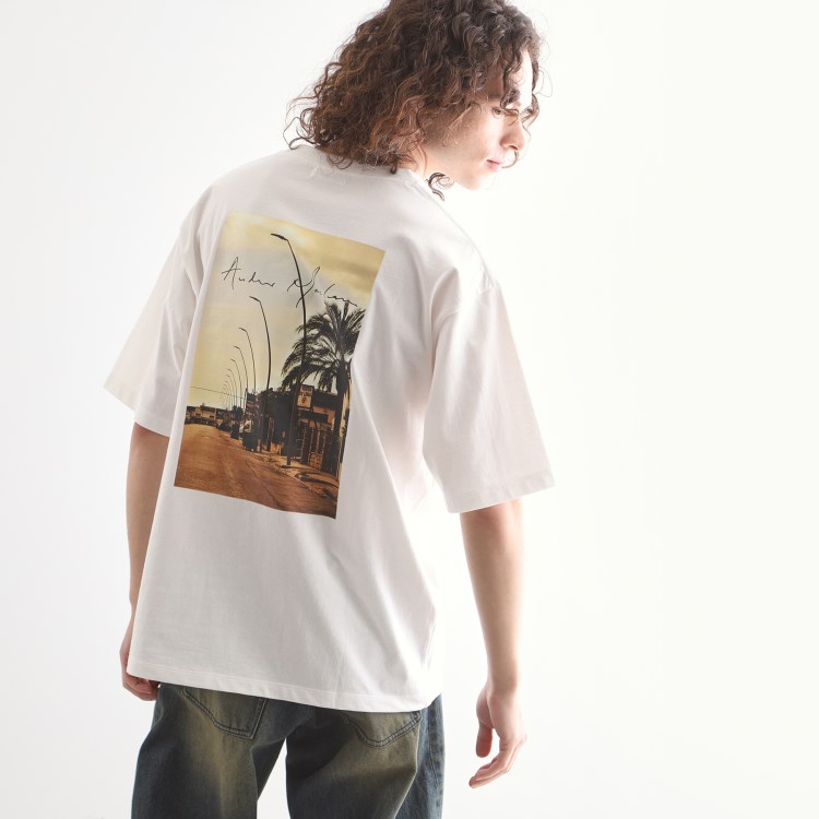 ティーケー タケオ キクチ(tk.TAKEO KIKUCHI)のアンドリューマクリア バックプリントフォトTシャツ Ｔシャツ