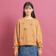 ピンク ラテ(PINK-latte)の落書き風プリント短丈プルオーバー1