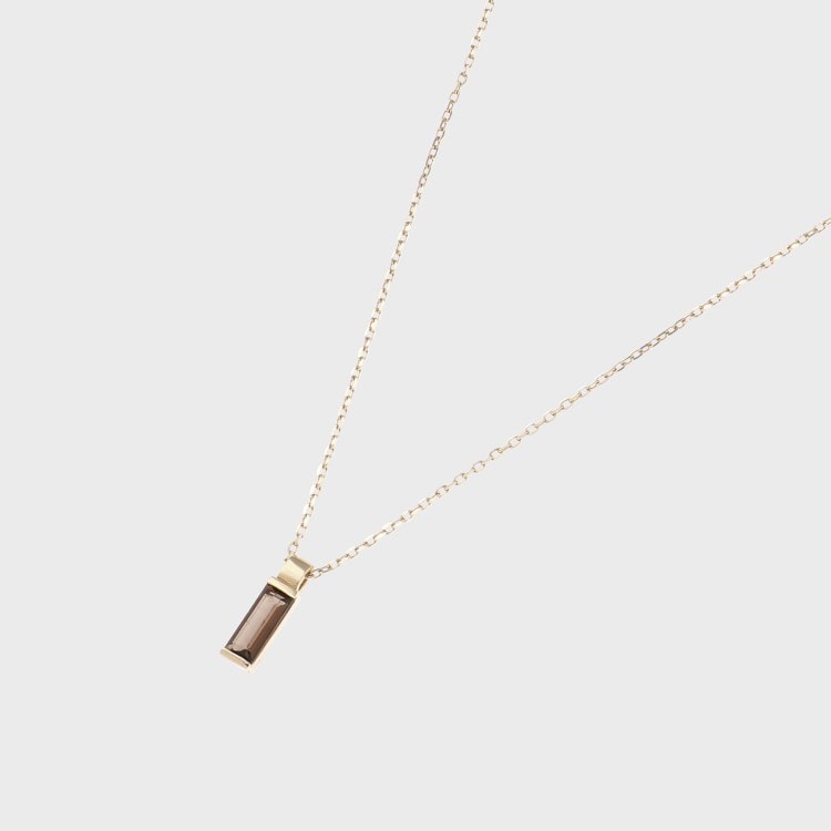 ココシュニック(COCOSHNIK)のK10カラーストーン（スモーキークォーツ）バゲットカット ネックレス ネックレス