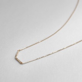 ココシュニック(COCOSHNIK)のダイヤモンド　カーブネックレス ネックレス