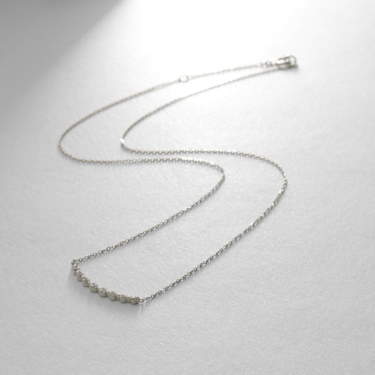 ココシュニック(COCOSHNIK)のプラチナ ダイヤモンド グラデーション9石 ネックレス ネックレス
