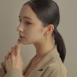 ココシュニック(COCOSHNIK)のK10サイドカットオーバル フープピアス6