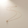 ココシュニック(COCOSHNIK)のK10【サステナブル】モアサナイトパヴェスルー ネックレス1