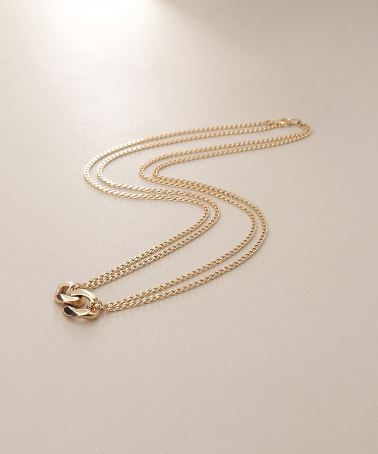 ココシュニック(COCOSHNIK)のK10キヘイモチーフダブルチェーン ネックレス1