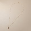 ココシュニック(COCOSHNIK)のK10ダイヤモンド アシンメトリークロス ネックレス6