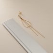 ココシュニック(COCOSHNIK)のK10コンパクトリボンフリンジ スタッドピアス4