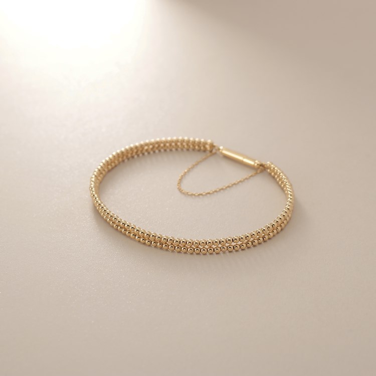 ココシュニック(COCOSHNIK)のK18丸玉2連マグネット バングル ブレスレット・バングル