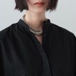 ギャレスト(GALLEST)のスタンドカラーペプラムブラウス8