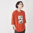 ザ ショップ ティーケー（メンズ）(THE SHOP TK(Men))のポンチビッグシルエットプリントTシャツ オレンジ(169)
