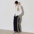 ギャレスト(GALLEST)の【LACOSTE】サイドニットテーピングフレアトラックパンツ1