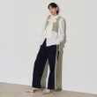 ギャレスト(GALLEST)の【LACOSTE】サイドニットテーピングフレアトラックパンツ ネイビー(094)