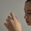 ココシュニック オンキッチュ(COCOSHNIK ONKITSCH)のシルバー フラットカーブチェーンモチーフリング12