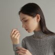 ココシュニック オンキッチュ(COCOSHNIK ONKITSCH)のシルバー ロングカーブチェーンモチーフリング GP6