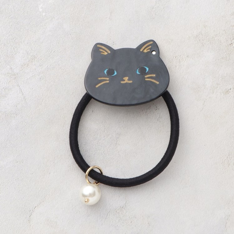 グローブ(grove)のネコフェイスパール調ポニー ヘッドアクセサリー