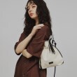 ティーケー タケオ キクチ(レディース)(tk.TAKEO KIKUCHI(Ladies))のADAMPATEK 別注 アソート巾着ショルダーバッグ アイボリー(204)