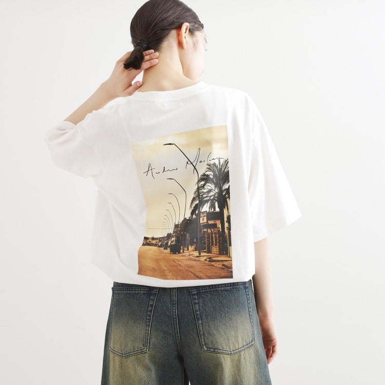 ティーケー タケオ キクチ(レディース)(tk.TAKEO KIKUCHI(Ladies))のアンドリューマクリア バックプリントフォトTシャツ Ｔシャツ