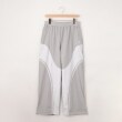 オフプライスストア(メンズ)(OFF PRICE STORE(Mens))のNERDY（ノルディ） CURVED BLOCK WOVEN PANTS ライトグレー(011)