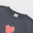 プティマイン(petit main)の袖フリルTシャツ2