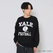 グラソス(GLAZOS)の【YALE】フロントフットボールロゴプリントトレーナー ブラック(219)