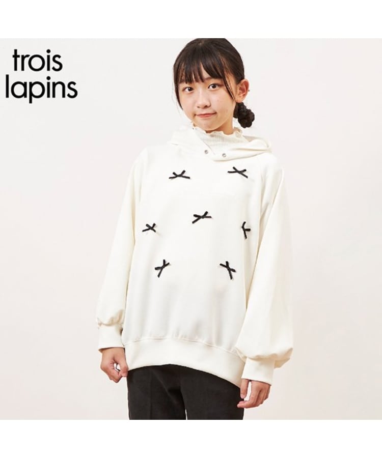 ケーピー(KP)のtroislapins(トロワラパン)フードツキリボントレーナー(140～160) アイボリー(104)