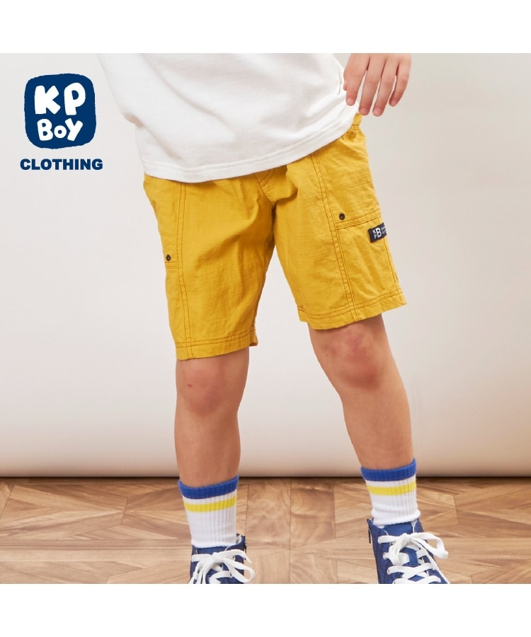 ケーピー(KP)のスラブ織りハーフパンツ イエロー(031)