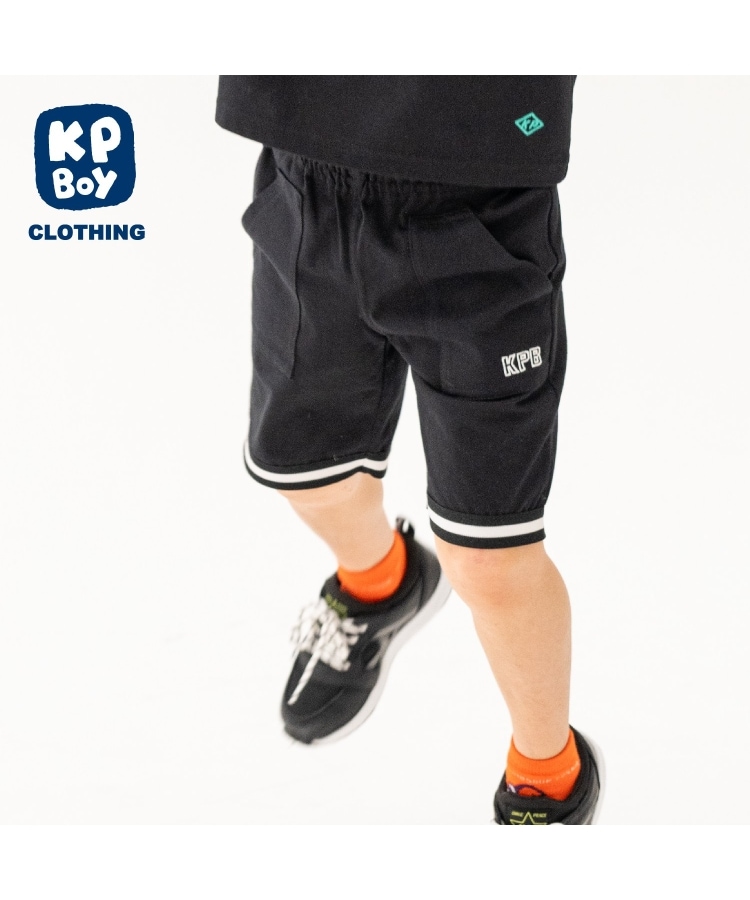 ケーピー(KP)のソロナラインテープつきハーフパンツ ブラック(219)